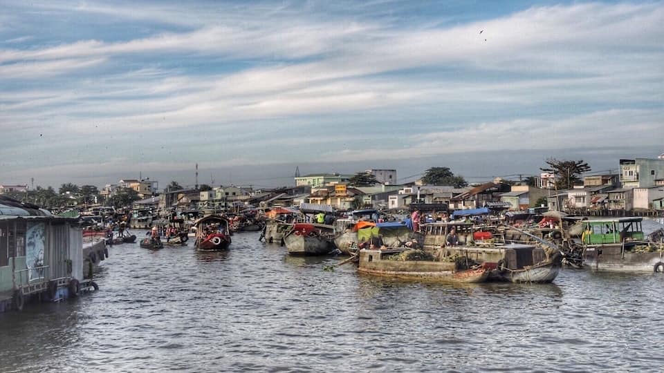 The floating market in Can Tho. Very crowded of sellers and buyers from 5 till 7 am.