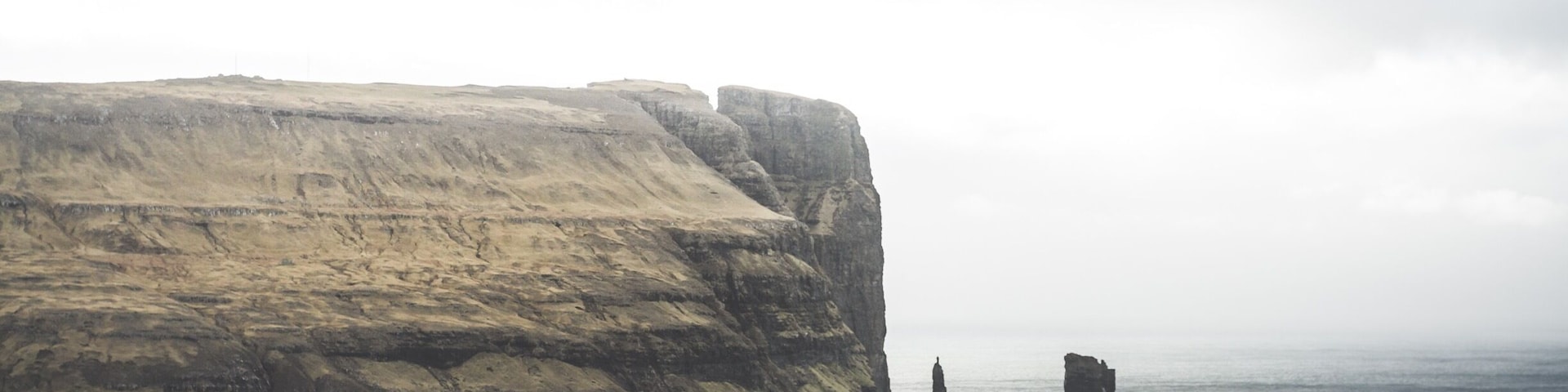 Risin og Kellingin, meaning Giant and the Witch, are two sea stacks off the coast of Eysturoy island. Their height is 71 meters (232 ft) and 68 meters (223 ft). The name relates to an ancient legend that tells the story of the stacks origin, #TroveOn #TakeAHike
https://www.facebook.com/ShotByCanipel/
https://www.instagram.com/canipel/