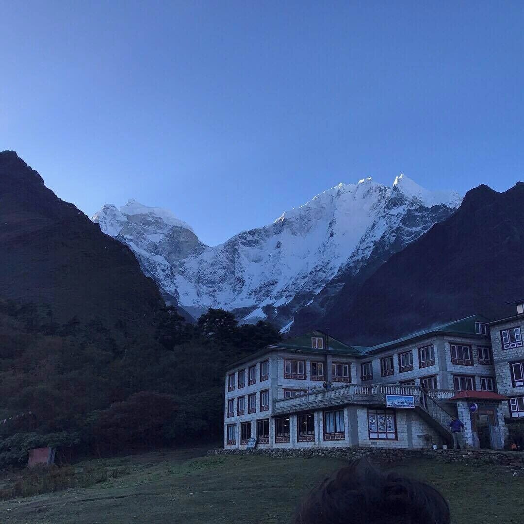 After hours of long, uphill trekking, you finally arrive in a very small and remote village of Tyangboche. The large monastery sits proud and tall at your entrance, where you'll hear the monks chanting and spinning the prayers wheels. The rest of the village is composed of a few small, basic teahouses where you'll lodge for the night. The toilets may be cold and outside, but the views of Everest and surrounding mountains are so incredibly worth it.