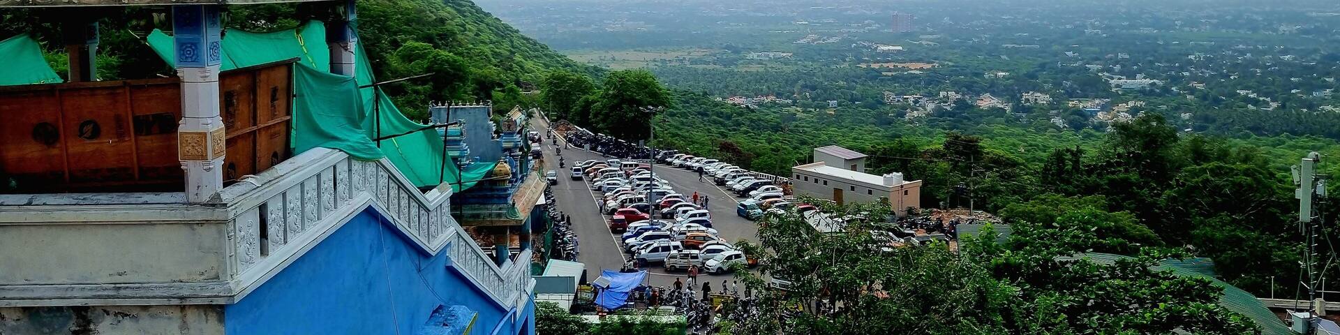 Scenic view from Maruthamalai Temple, a famous hilltop temple in Coimbatore, Tamil Nadu, dedicated to Lord Murugan, known for its serene atmosphere and panoramic city views