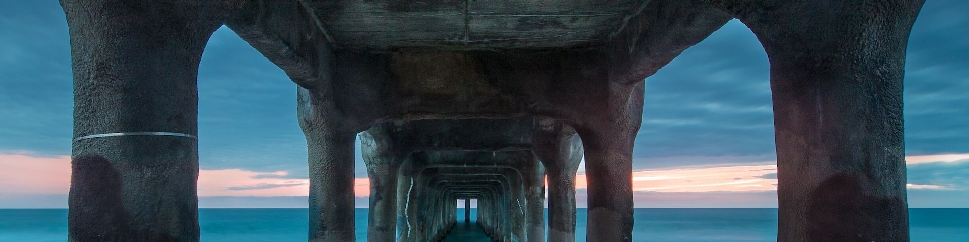 Evening shoot of the Pier on April 7. Shooting underneath the pier after most of the other photographers went home. Not HDR, single exposure image.