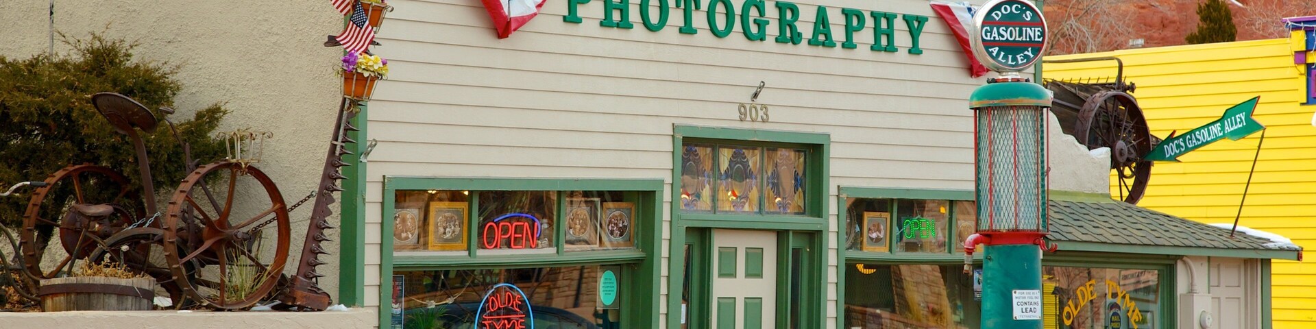 Manitou Springs featuring signage and a small town or village