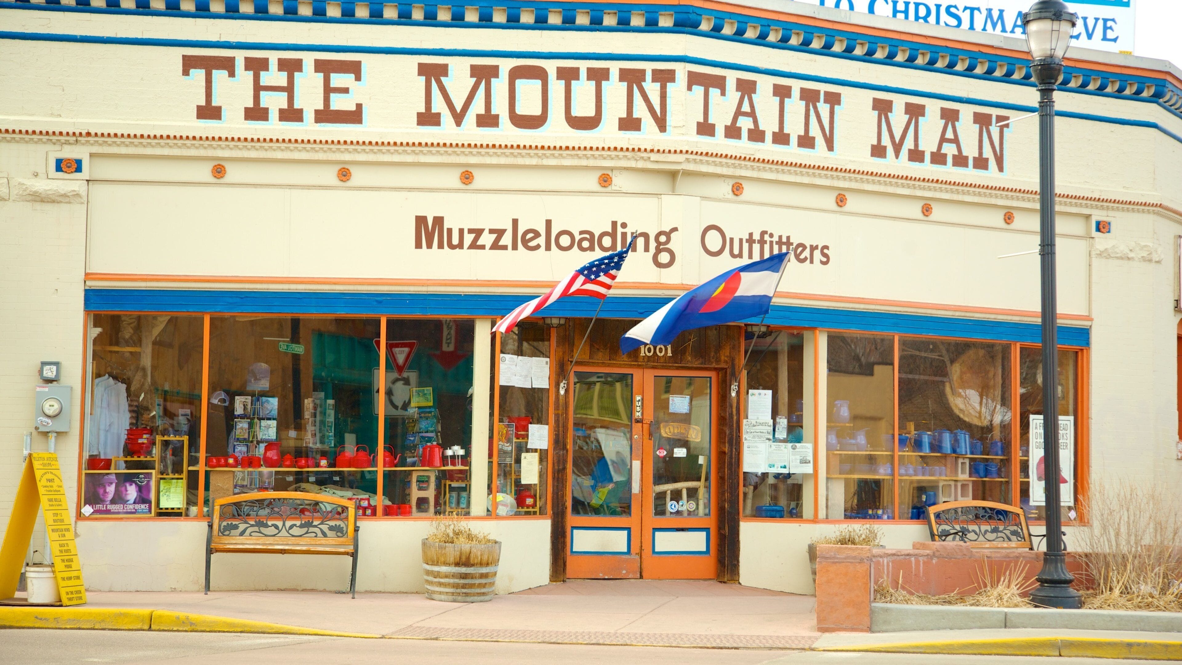 Manitou Springs which includes signage and a small town or village