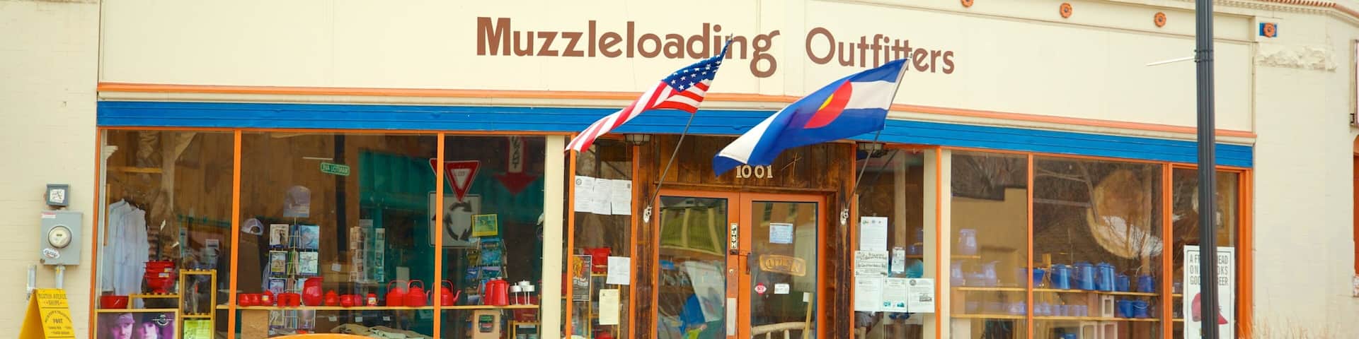 Manitou Springs which includes signage and a small town or village