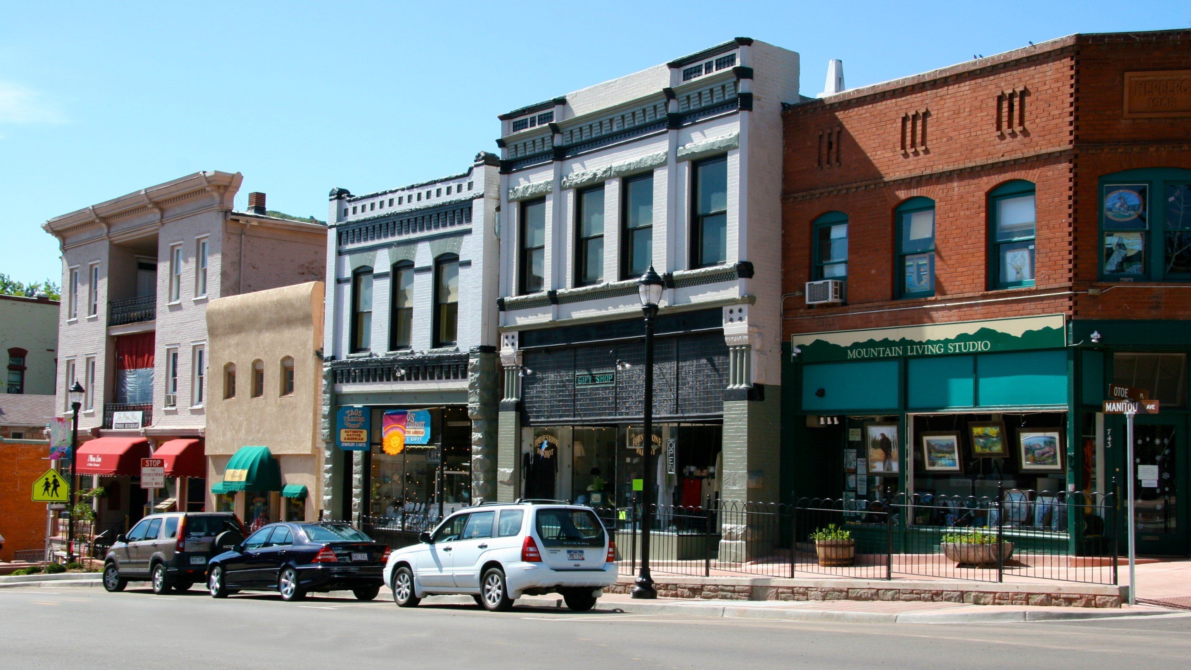Manitou Springs which includes street scenes and a small town or village