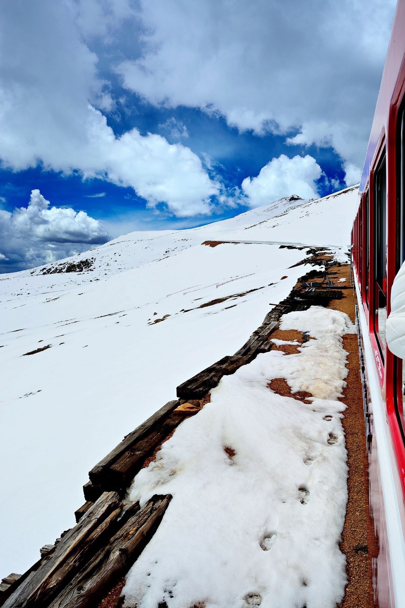 When you find yourself in Manitou Springs take the time to ride the Cog Railway up to Pikes Peak.  The mountain views are unbeatable! #getoutdoors #landtripping #mountains #bluebirdskies #colorado
