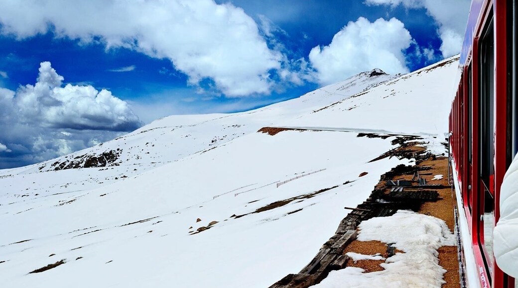 When you find yourself in Manitou Springs take the time to ride the Cog Railway up to Pikes Peak. The mountain views are unbeatable! #getoutdoors #landtripping #mountains #bluebirdskies #colorado