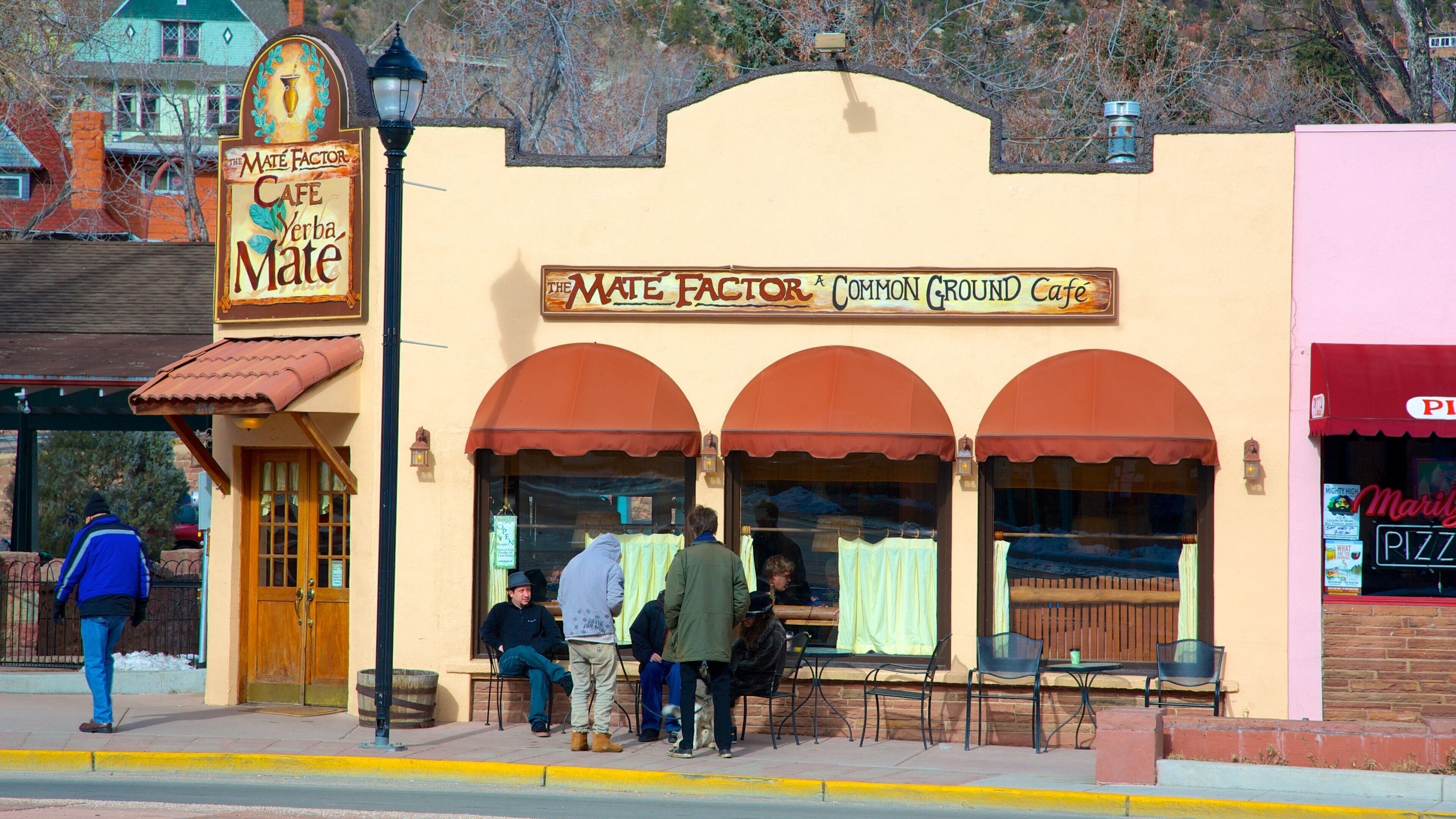 Manitou Springs featuring a small town or village and signage