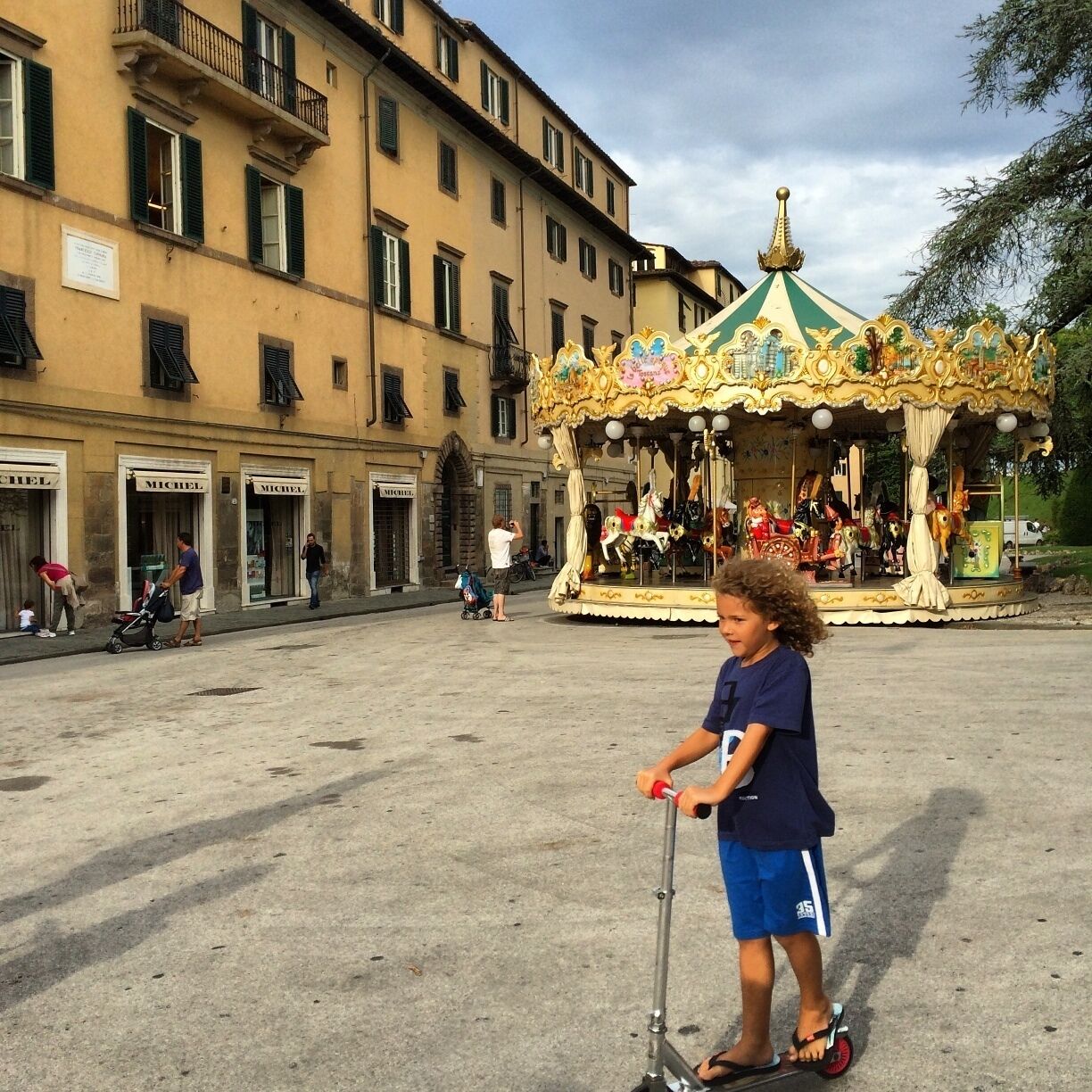 My daughter loves carousels. Unfortunately didn't have time to ride this one after biking all around the lovely town of Lucca. #dishourtown in #lucca #tuscany #carousel