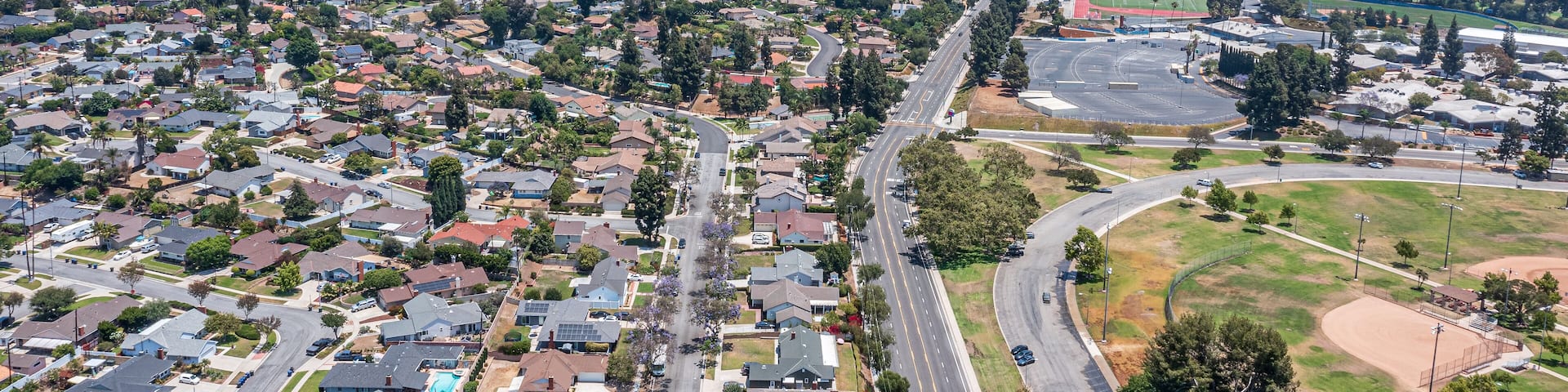 Aerial view of sports park in suburban California neighborhood.