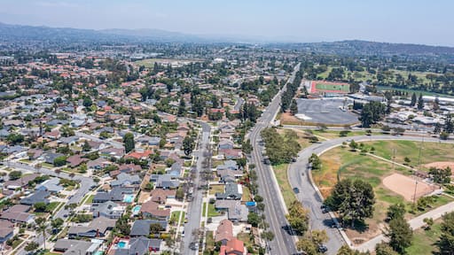 Aerial view of sports park in suburban California neighborhood.