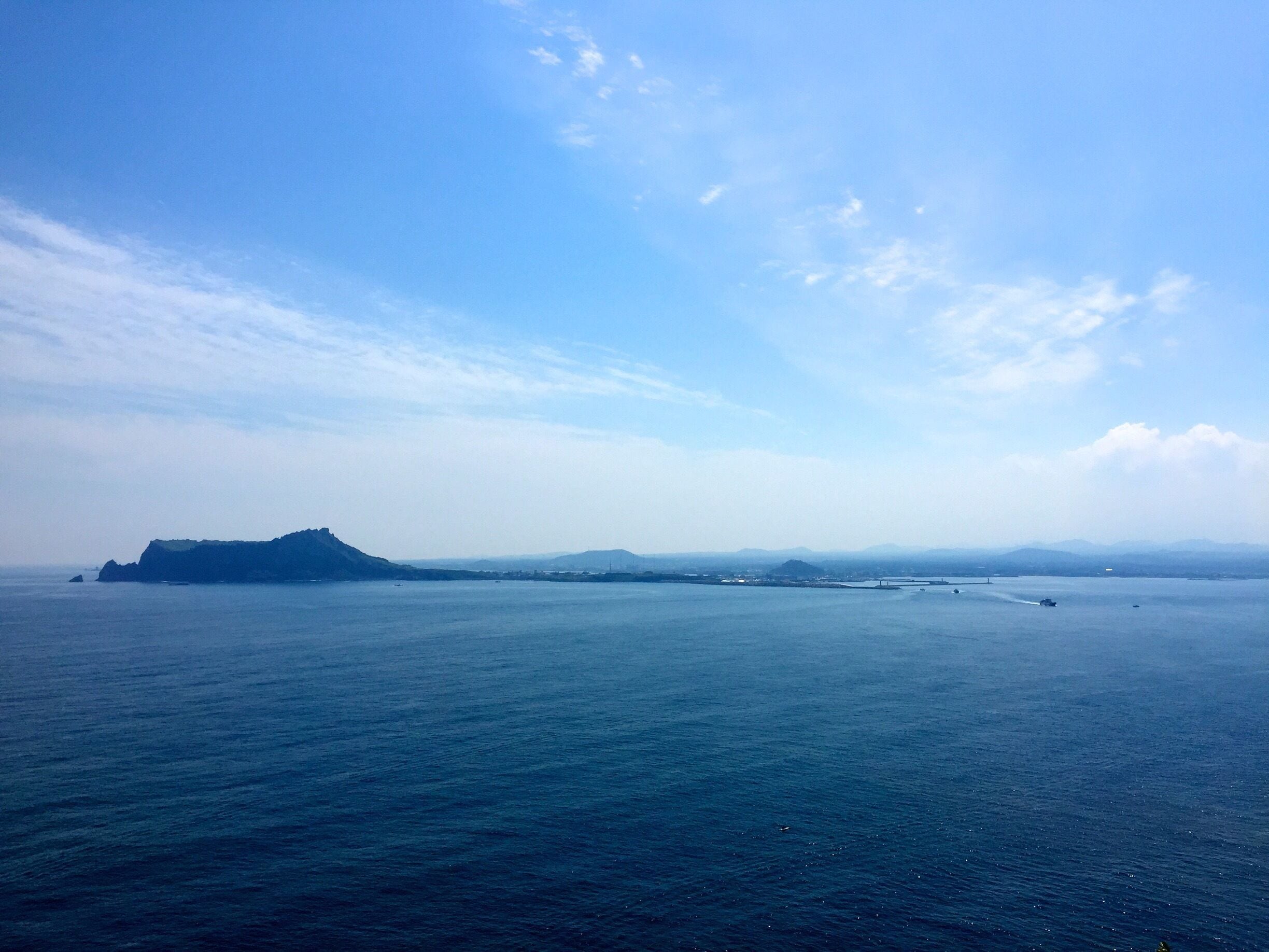 Looking back at Jeju from Udo island.

Take the 15 minute ferry ride over to Udo for a day trip or even spend the night camping on the beach or in a pension. Rent ATVs or scooters to explore the whole island. As always, try to avoid holiday weekends, as it's a very popular holiday destination in Korea.
