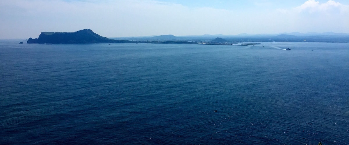 Looking back at Jeju from Udo island.
Take the 15 minute ferry ride over to Udo for a day trip or even spend the night camping on the beach or in a pension. Rent ATVs or scooters to explore the whole island. As always, try to avoid holiday weekends, as it's a very popular holiday destination in Korea.