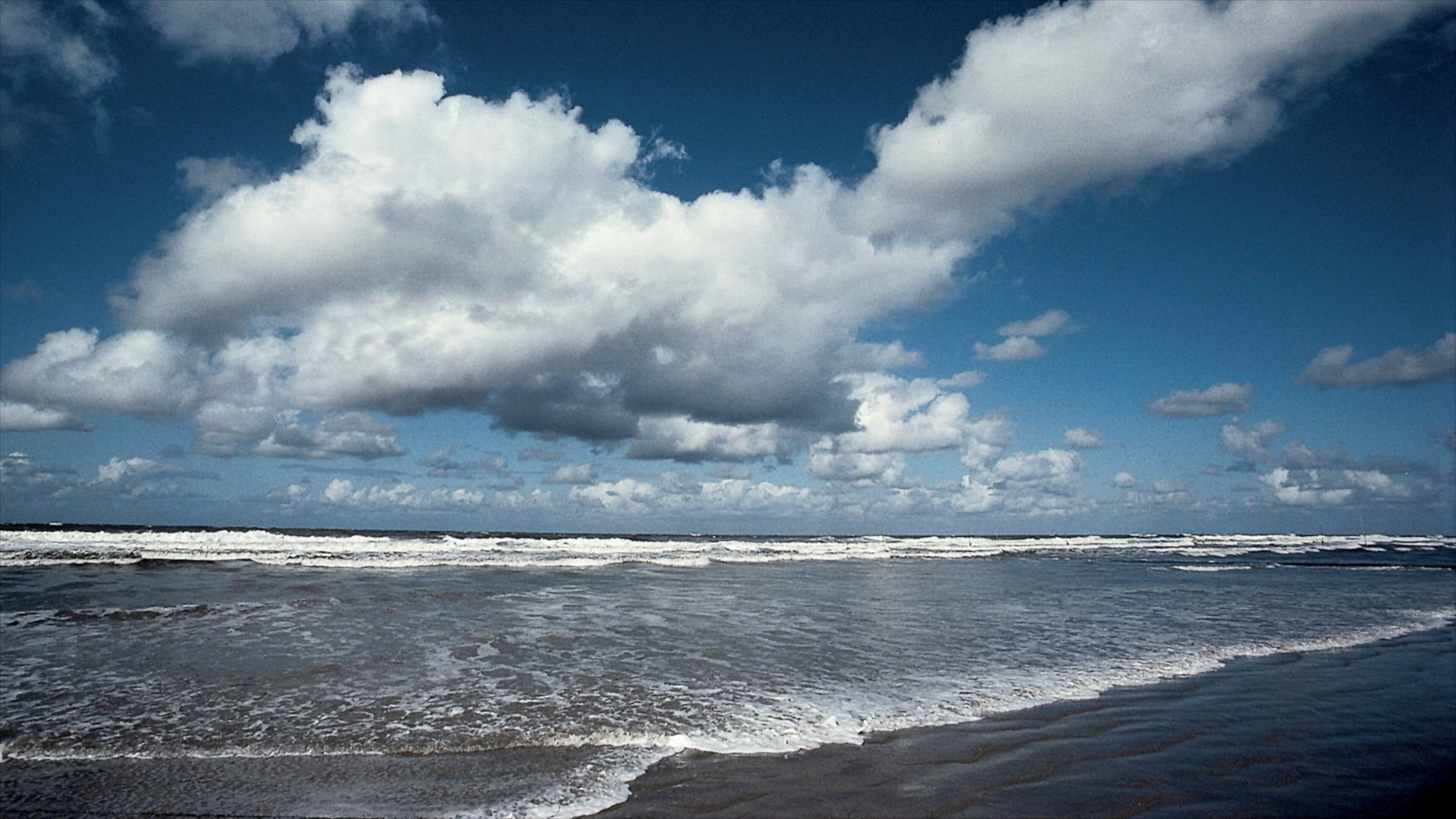 Langeoog caracterizando uma praia de areia e paisagem
