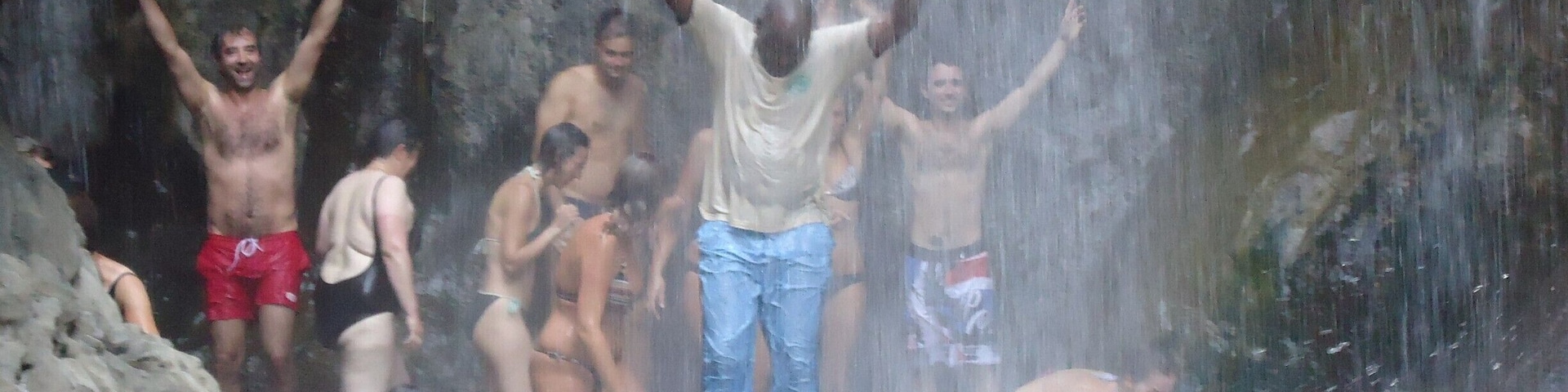 This tourist decided to have a swim at the waterfalls with their guide Steven, but steven refused to put in a swim suite claiming that he was a married maasai.