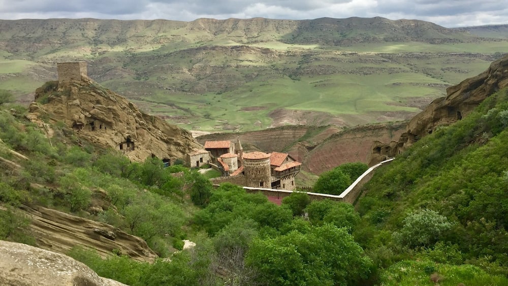 Davit Gareji or David Garedzha Monastery is located in the Grasslands of Georgia, 2.5 hours South-East of Tbilisi. This place and the surrounding nature are a "different world" and worth visiting. The road via Sagarejo and Udabno has road signs, is easy to find and also good enough for 2-wheel drive. The road via Rustavi (stupidly suggested by Google maps) has no signs, requires GPS and a 4-wheel drive is recommended (we drove that dirt road on the way back to Tbilisi and we did not meet any car for 20 km). A nice young couple is running a small adventurous hotel in Udabno ("Oasis Club", www.oasisclubudabno.com) also offering Horse Riding Tours, etc.