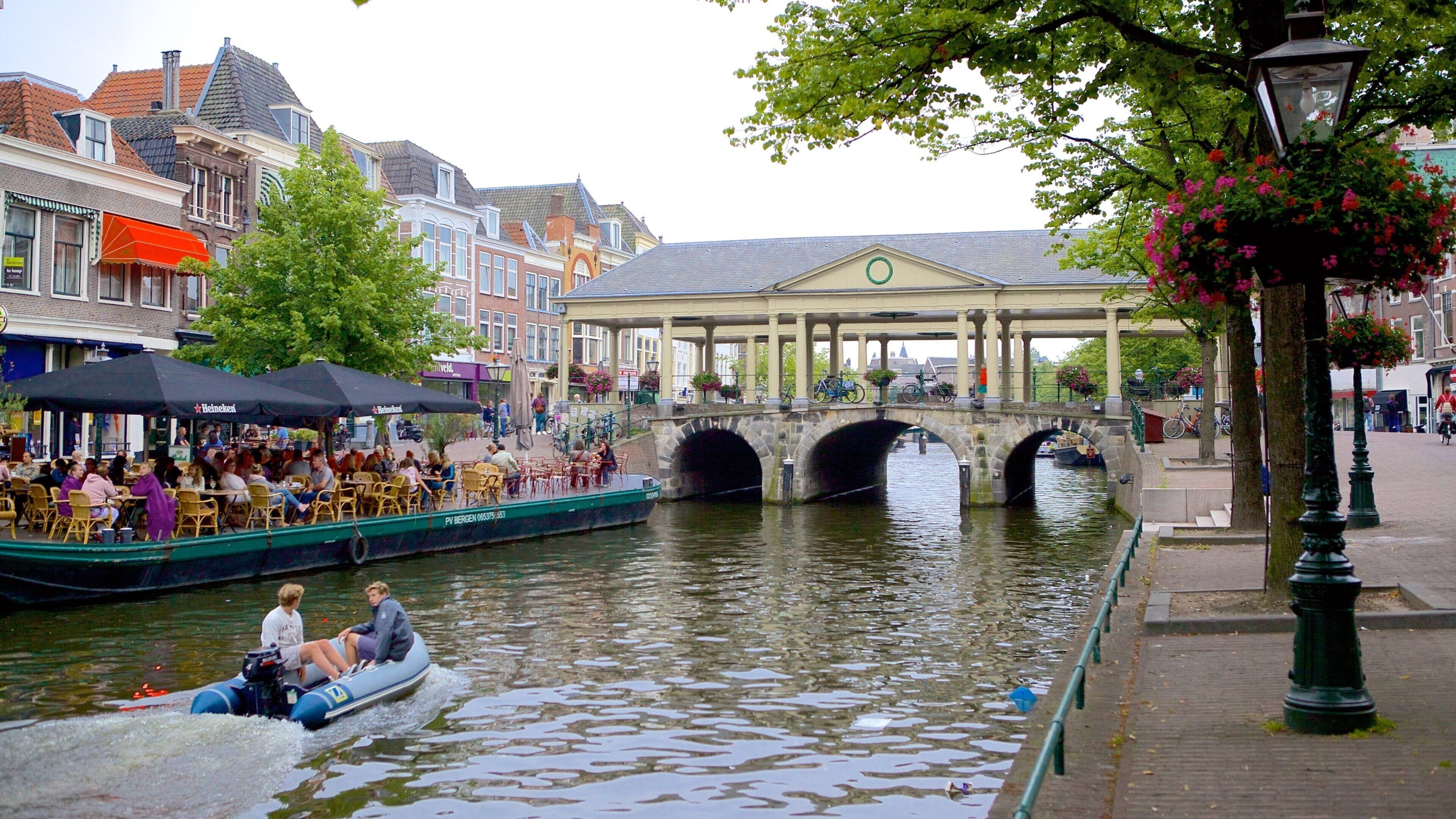 Leiden featuring a river or creek, a bridge and cafe scenes