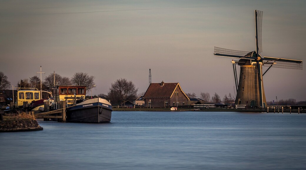 Windmills and waterways just outside of Leiden city. Classic dutch scenery.