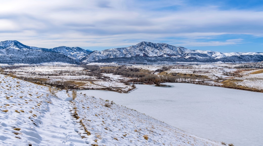 Winter Park - A bright sunny Winter day overview of snow-covered Bear Creek Lake Park, as seen from Mt. Carbon. Denver-Lakewood-Morrison, Colorado, USA.