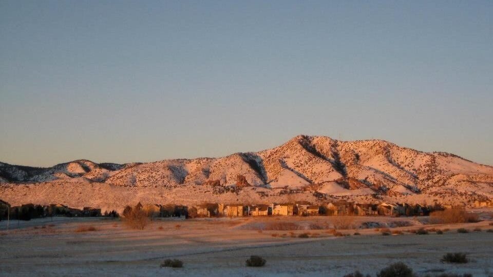 Lakewood, Denver. Just an dash of snow on Rockies, like icing sugar