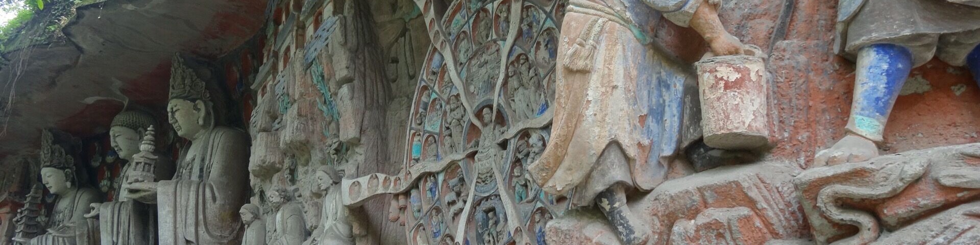 Dazu Rock is a complex of gigantic rock statues based on Chinese mythology and historical people.