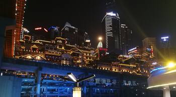 At night, Chongqing is filled with light. Enjoy the show from a river cruise along the Jianglin and Yangzi rivers