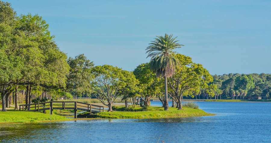 A beautiful day for a walk and the view of the wood bridge to the island at John S. Taylor Park in Largo, Florida., Shutterstock ID 649695496, Purchase Order: Wave 0 First Batch, Order Number: , Clien