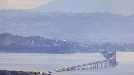 Richmond - San Rafael Bridge curves over San Francisco Bay on hazy day
