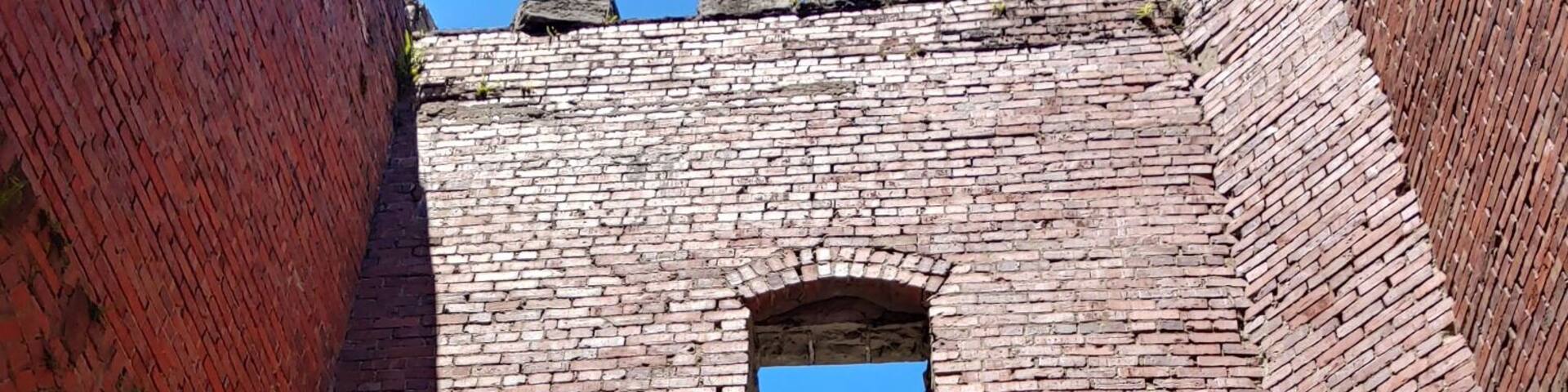 Not so much a castle, as the shell of a gatekeeper's house built around 1897.
It was more or less abandoned until the Cleveland Metroparks bought the land in 1925. The Metroparks removed the second floor and filled in the basement.