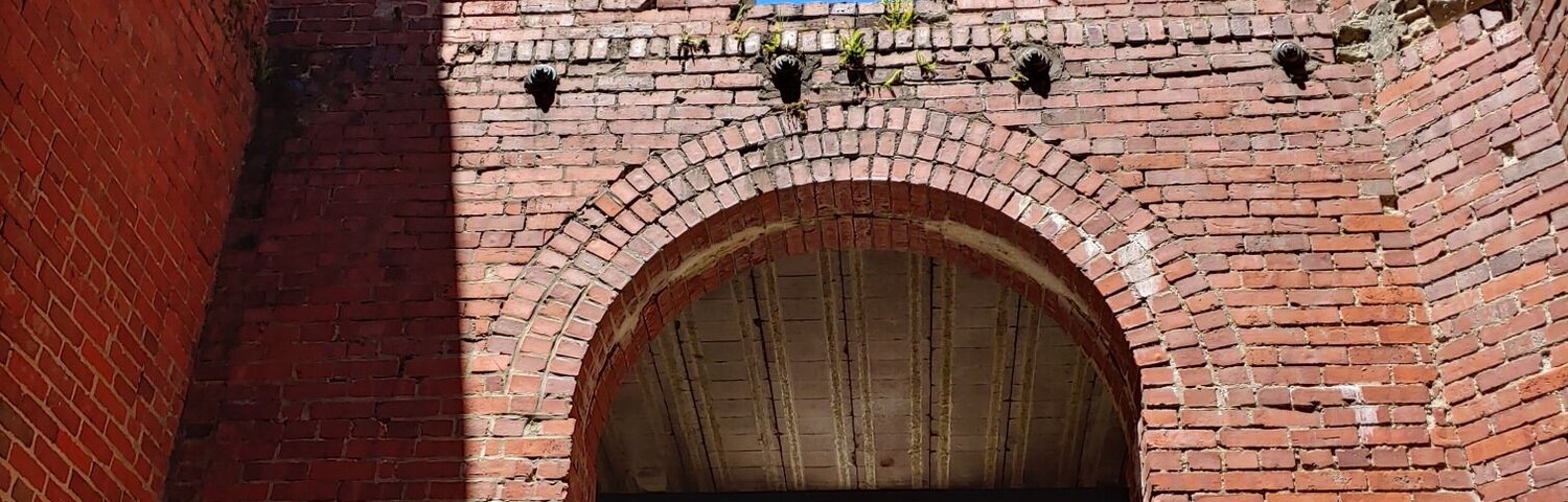 Not so much a castle, as the shell of a gatekeeper's house built around 1897.
It was more or less abandoned until the Cleveland Metroparks bought the land in 1925. The Metroparks removed the second floor and filled in the basement.
