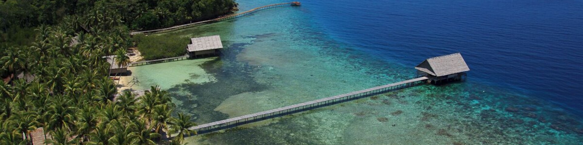 Vief from our small house mountain on Pulau Pef.
Pulau Pef is a small island in Raja Ampat, Indonesia, with the resort and dive center called Raja4Divers.
Raja Ampat consists of a number of groups of islands situated off the northwest end of West Papua. It is one of the best places for scuba diving and its coral reefs are extremely rich with an amazing biodiversity.
This picture has been taken from a platform on the small house mountain.
We arrived on the small island Pef end of February and are now working in this stunnig part of the world. ;-)
Read more about our new home on: http://www.swissnomads.com/2015/03/pulau-pef-in-raja-ampat/