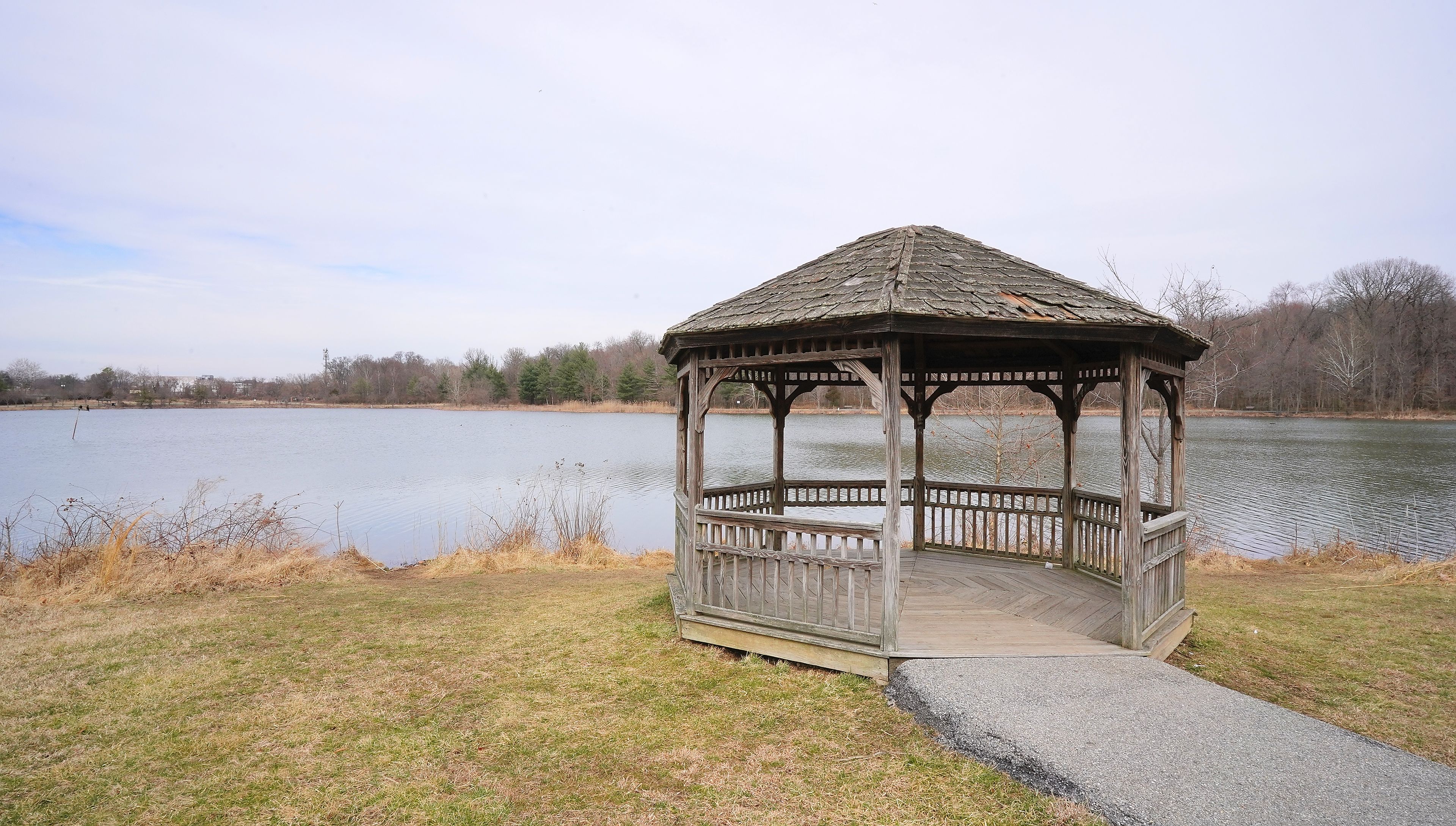 Wooden structure at Lake Artemesia during cold grey cloudy winter day (College Park, Maryland, USA). 