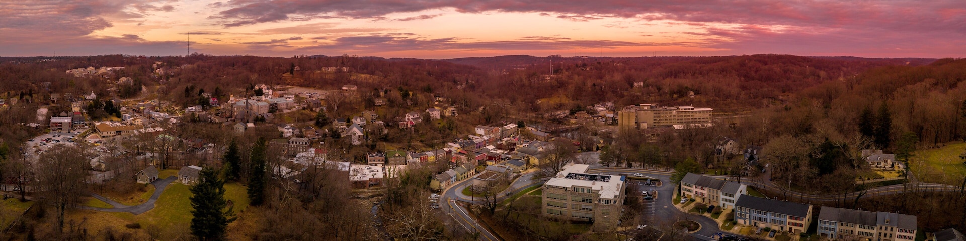Sunset aerial panorama of Historic Old Ellicott City Maryland, USA typical civil war era small town with the oldest train station, rebuilding after deadly floods