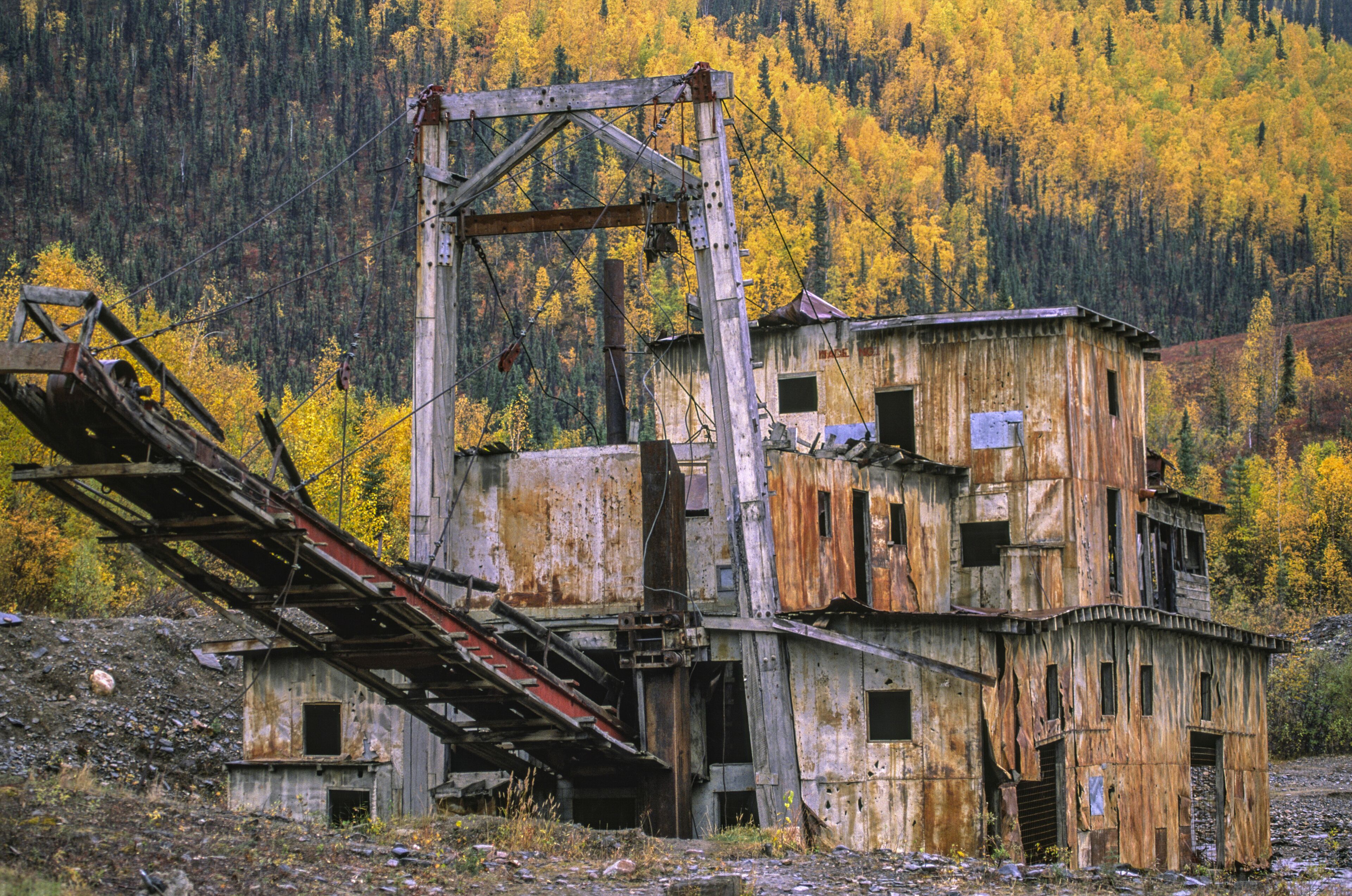 Old gold dredge inAlaska in autumn, USA; Chicken, Alaska, United States of America