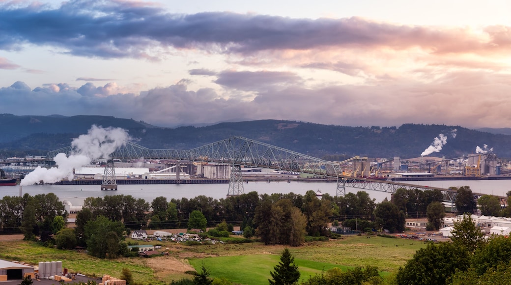 Longview, Washington, United States of America. Aerial Panoramic View of Port, Industrial Sites and Lewis and Clark Bridge over Columbia River. Sunrise Sky