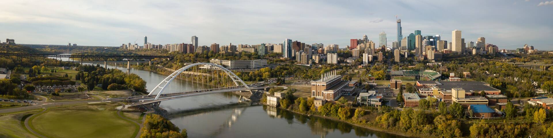 Aerial panoramic view of the beautiful modern city during a sunny day. Taken in Edmonton, Alberta, Canada.