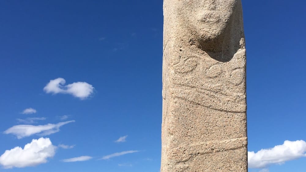One of the amazing deer stones that dot the countryside of Mongolia. What is most memorable is that you can walk amongst them despite their age.