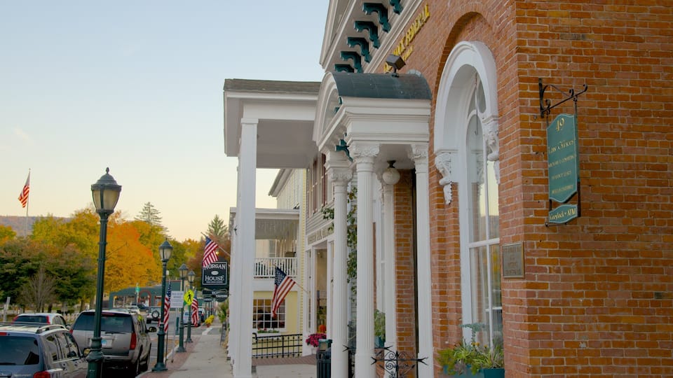 A brick building with white columns and a sign for the Morgan House restaurant.