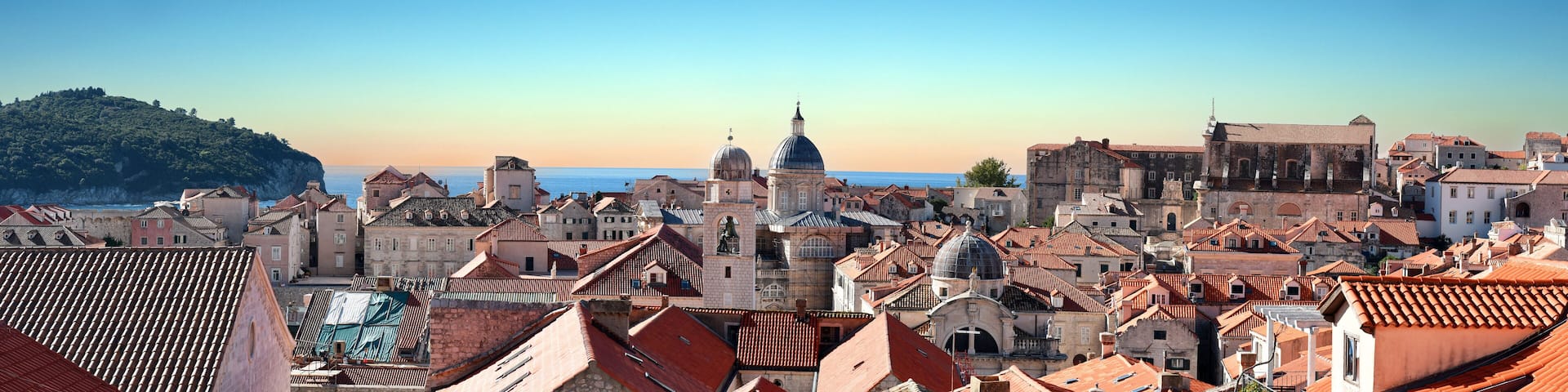 panoramic view to the city skyline of Dubrovnik's Old City while sunrise