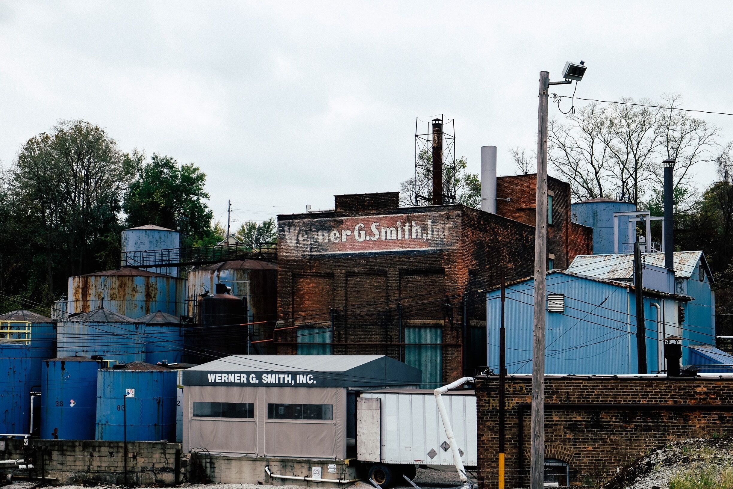Industrial rust is one of the most beautiful things. The worn signage, faded brick, and rust. #Architecture