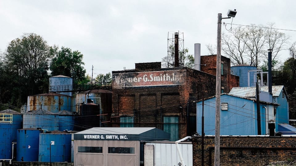 Industrial rust is one of the most beautiful things. The worn signage, faded brick, and rust. #Architecture