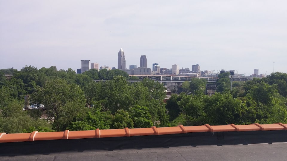 The view of downtown Cleveland from the roof of the Tremont Athletic Club in the former Fairmount Creamery Company building. Inner Bliss Yoga Studio offers rooftop yoga classes at this spot.