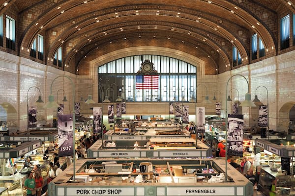 The West Side Market is home to dozens of vendors selling everything from fresh meat and produce to yummy baked goods to all sorts of specialty foods. It’s not just a fun place to take tourists, but also a place where locals frequently do their shopping.
To get this classic overhead view of the inside of the main market building, there’s a stairwell near the restrooms at the market’s entrance on W 25th. A quick flight of stairs, and you’ll be on the second-floor balcony with this great view.