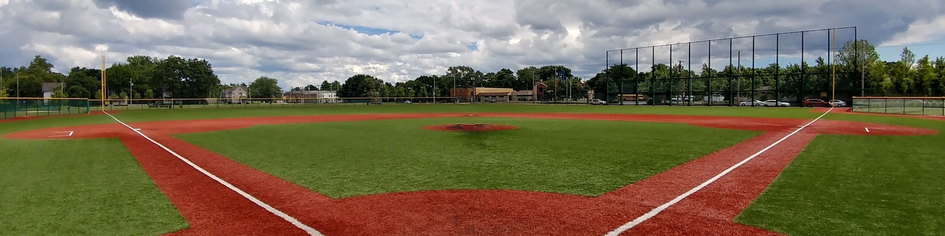 Opened on May 1st 1891 with Cy Young on the mound, Cleveland's League Park was off to a great start.
290 feet down the first base line and over a wall taller than Boston's Green Monster, Babe Ruth hit his 500th home run on August 11th 1929.
The original wooden ticket office and stands are gone. The corner building and a lone wall remain from the second iteration of brick.
The major leaguers may have moved downtown, but this field still boosts some pretty important baseball.