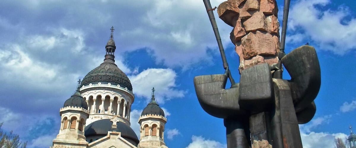 Avram Iancu square - Theotokos Othodox Church.
Both the square and the church are majestic and beautiful. The interior is humbling and stunning, well worth a visit. Please, better enter properly dressed.
This is the statue of the Romanian revolutionary Avram Iancu, who led the protests against the official union of Hungary and Transylvania.
More:
https://worldlings.wordpress.com/2016/04/27/transylvania-cluj-napoca/