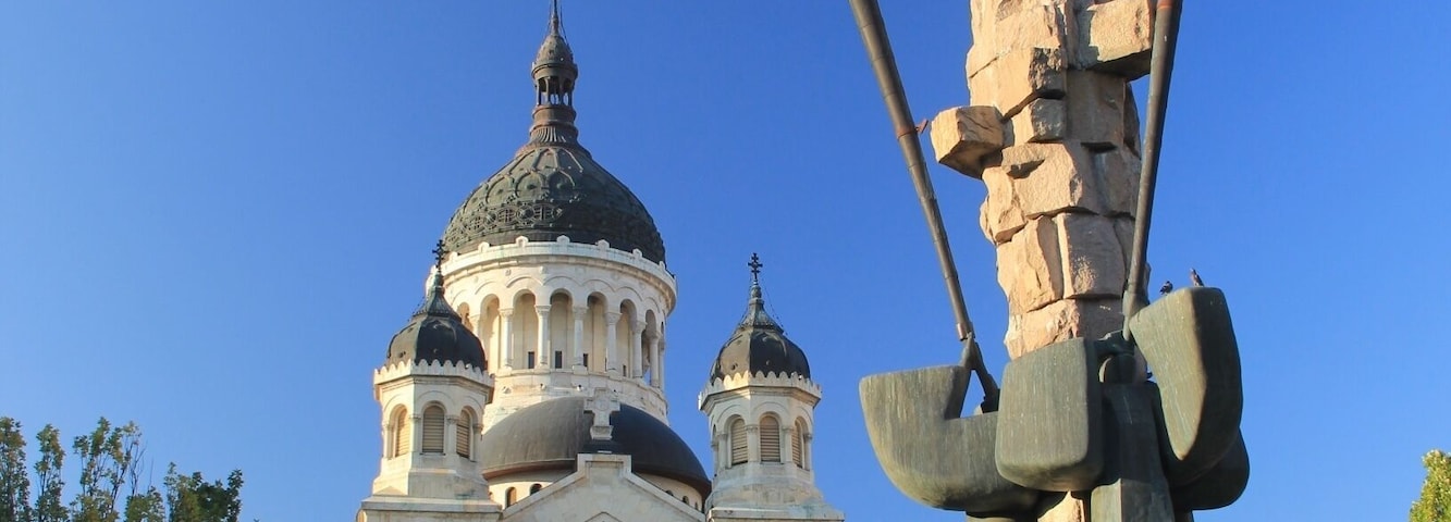 We spotted this building on route back from the Turda Salt Mine and then looked it up on the map when we hopped off the bus.
It's an Orthodox Cathedral and we were lucky enough to wander in just before an important ceremony. If you're in Cluj on a Sunday at 6pm, I thoroughly recommend you take a peek, it was utterly fascinating to watch.
Read more about what there is to see and do in Cluj-Napoca here:
http://galloparoundtheglobe.com/a-weekend-break-in-cluj-napoca-romanias-affordable-university-city/