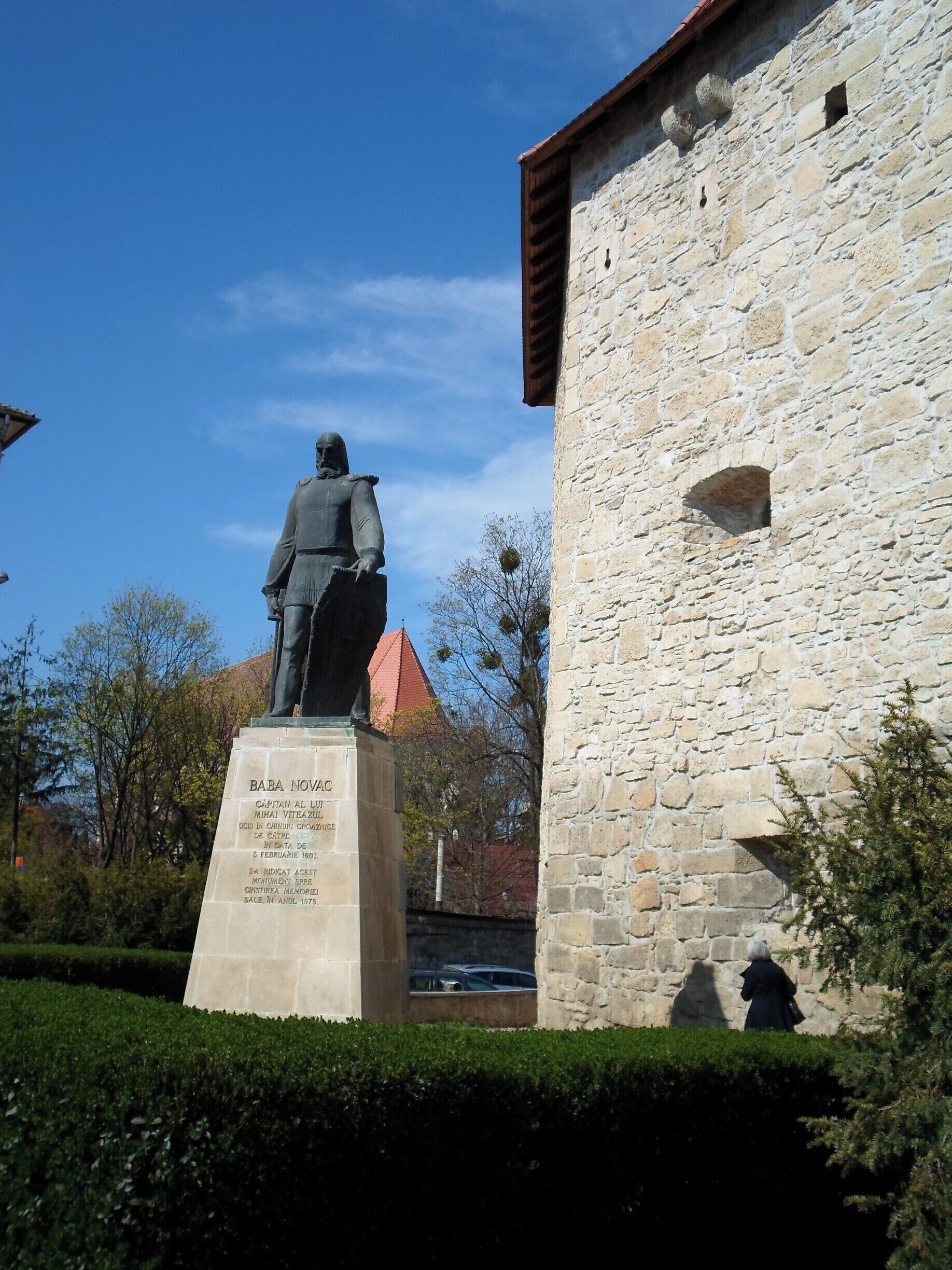 Tailors' bastion with Baba Novak statue.

Baba Novak is a Serbian-Romanian hero and bandit. He was the right arm of Mihail Viteazul, and Romanians dedicated him a statue that stands exactly on the place of his execution, in front of the Tailors’ Bastion.

More:
https://worldlings.wordpress.com/2016/04/27/transylvania-cluj-napoca/
