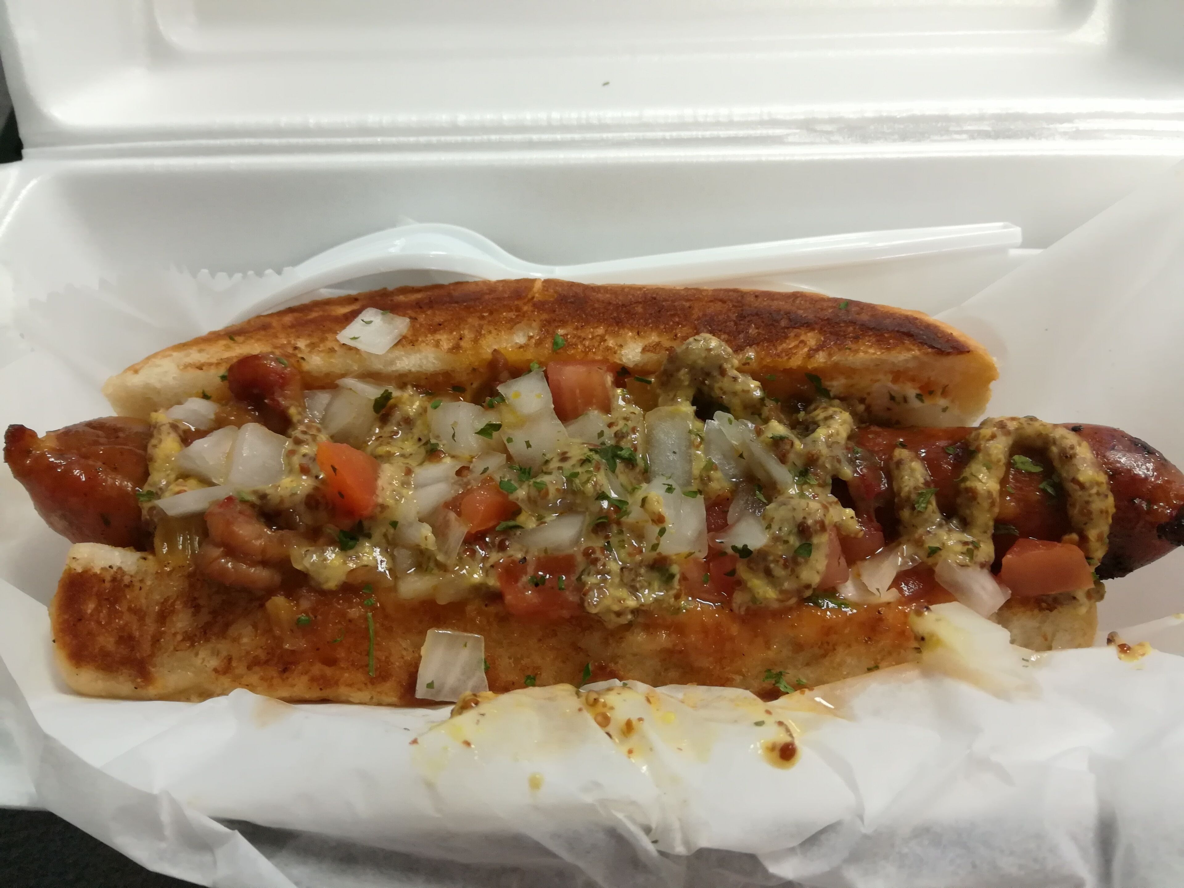 Dat Dog  has several kinds of sausages, like Slovenian sausage, Alligator sausage and Irish Guinness sausage. One of my favorite is the Crawfish Etouffee dog which has a Crawfish sausage. #GoodEats
