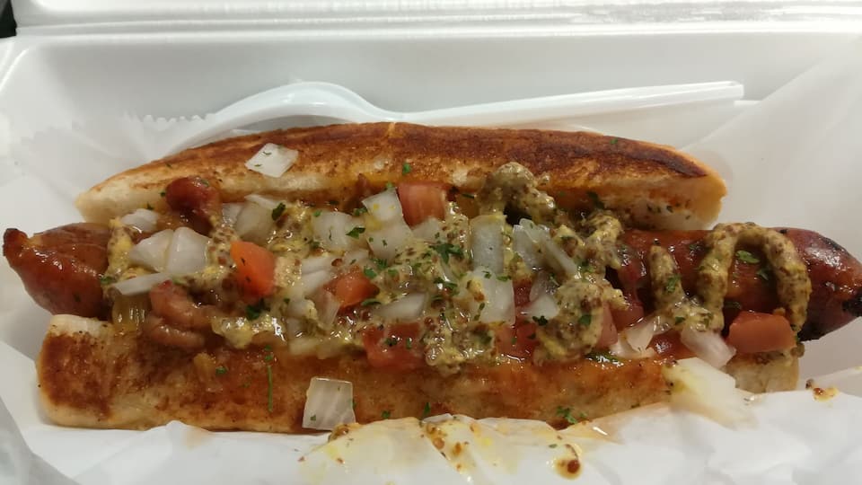 Dat Dog has several kinds of sausages, like Slovenian sausage, Alligator sausage and Irish Guinness sausage. One of my favorite is the Crawfish Etouffee dog which has a Crawfish sausage. #GoodEats