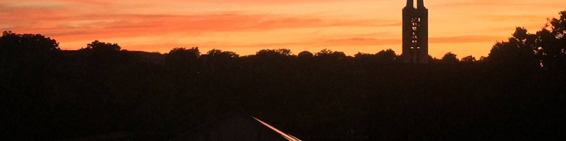 Dusk looking out over the valley below Mount Oread. Nothing beats wandering this scenic campus to the sound of the carillon bells which sound every quarter hour. On Wednesday evening and Sunday afternoons faculty or students perform on the instrument. Wander the green space around Potters Lake during a concert for a truly magical experience. The campanile is a WWII memorial, so be sure to check out the structure itself too.